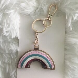 Woman’s rainbow keychain with chain and spring clip